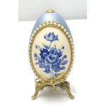 Sier ei met beschilderd porselein en parelrandje