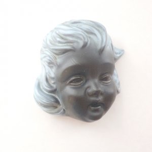 Keramiek kinder hoofdje