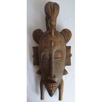 Afrikaans masker met vogel op hoofd