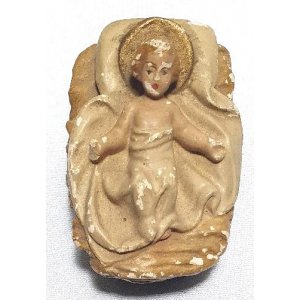 Jezus in krib, gemerkt 