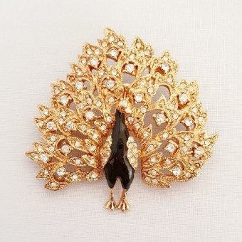 Broche pauw met strass